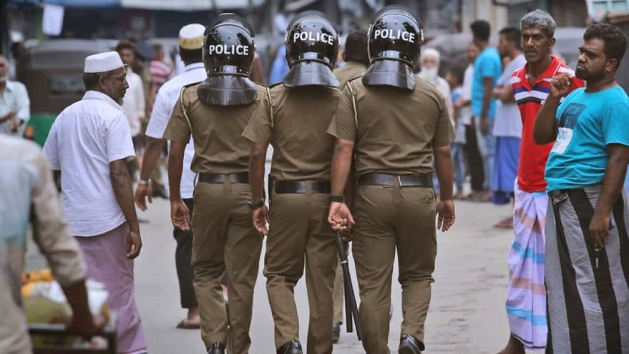 File photo, Sri Lankan policemen patrol a Muslim neighborhood before Friday prayers in Colombo