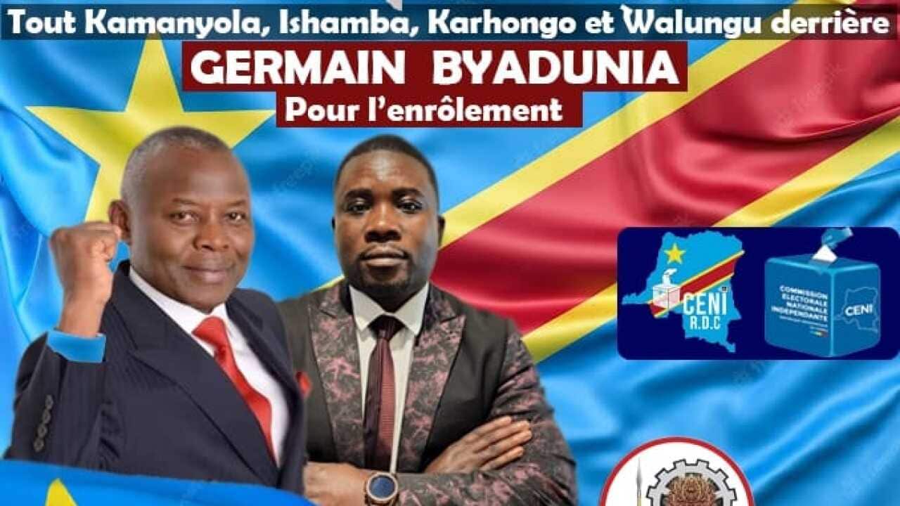 Bw Germain Byadunia kwenye bango pamoja na kiongozi wa UNC Mh Vital Kamerhe.jpg