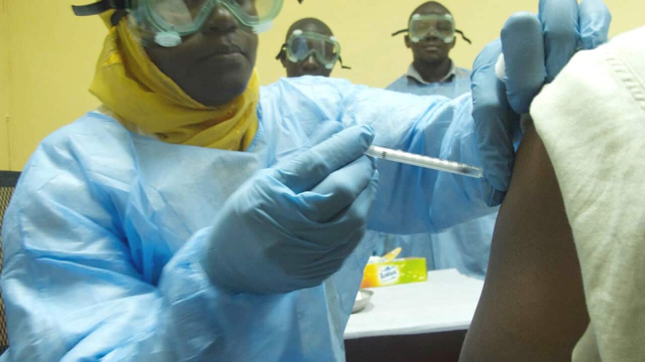 A volunteer receives the Ebola vaccination "cAd3-EBO-Z"