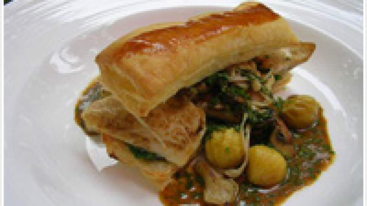 Mille feuille of white rabbit with truffle cream sauce