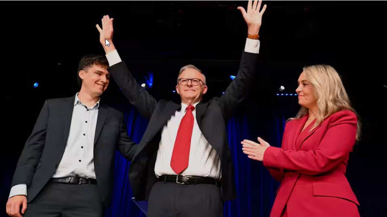 Australian Prime Minister Anthony Albanese, Partner Jodie Haydon and son Nathan acknowledge the crowd at the Labor Election Night function at Canterbury-Hurlstone Park RSL Club. Source: AAP / LUKAS COCH/AAPIMAGE