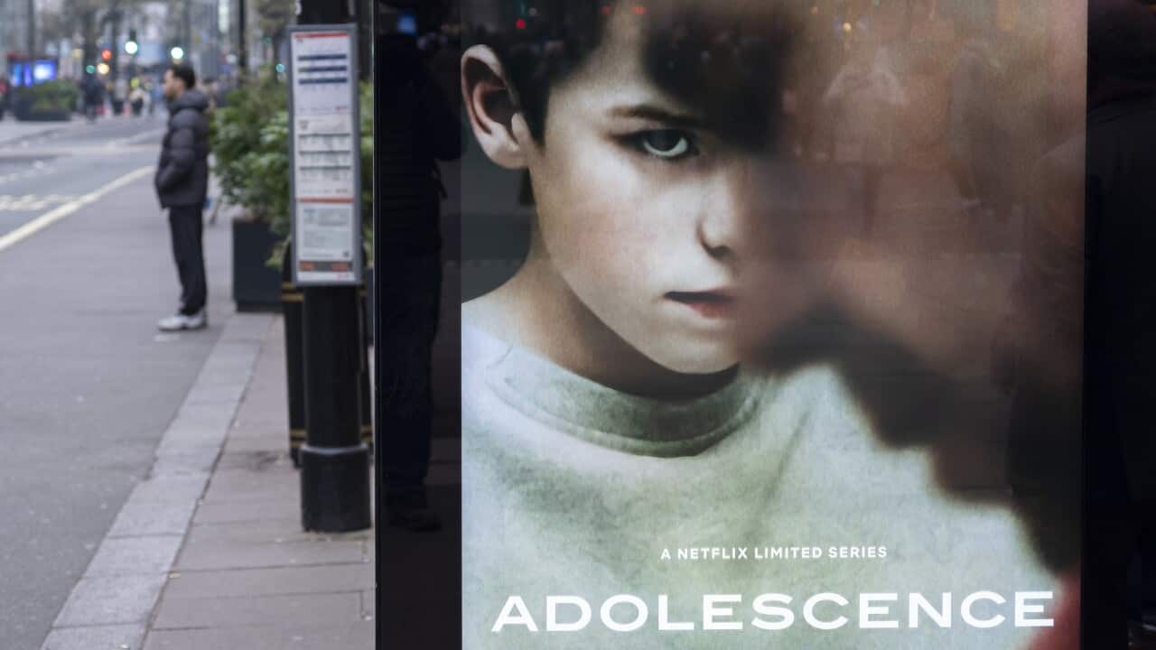 A close up of a billboard for the TV show Adolescence