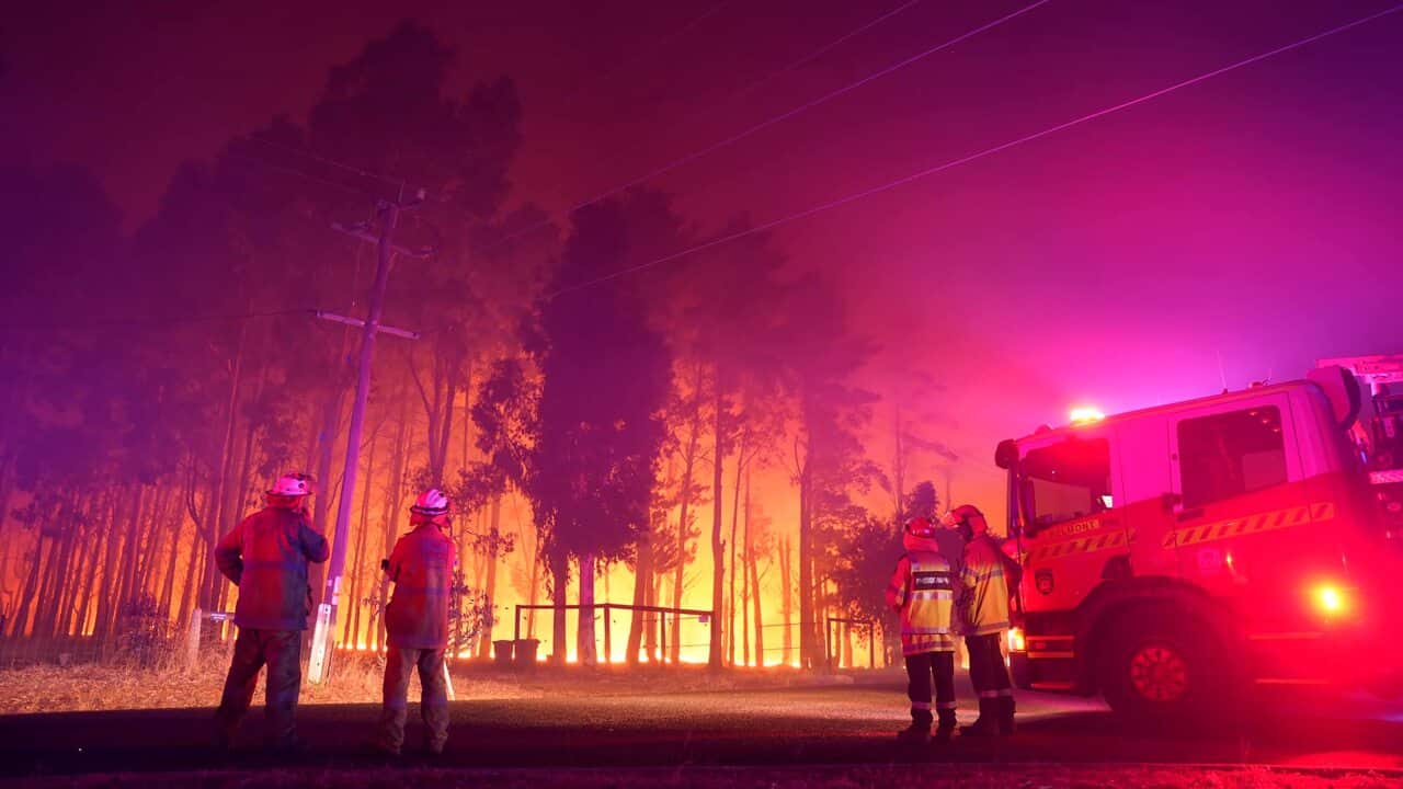 Firefighters attend the fire at Wooroloo, near Perth on Monday, 1 February.
