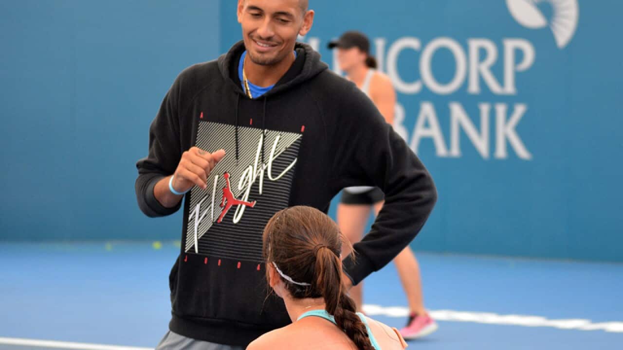 Australian player Nick Kyrgios speaks to Ajla Tomljanovic