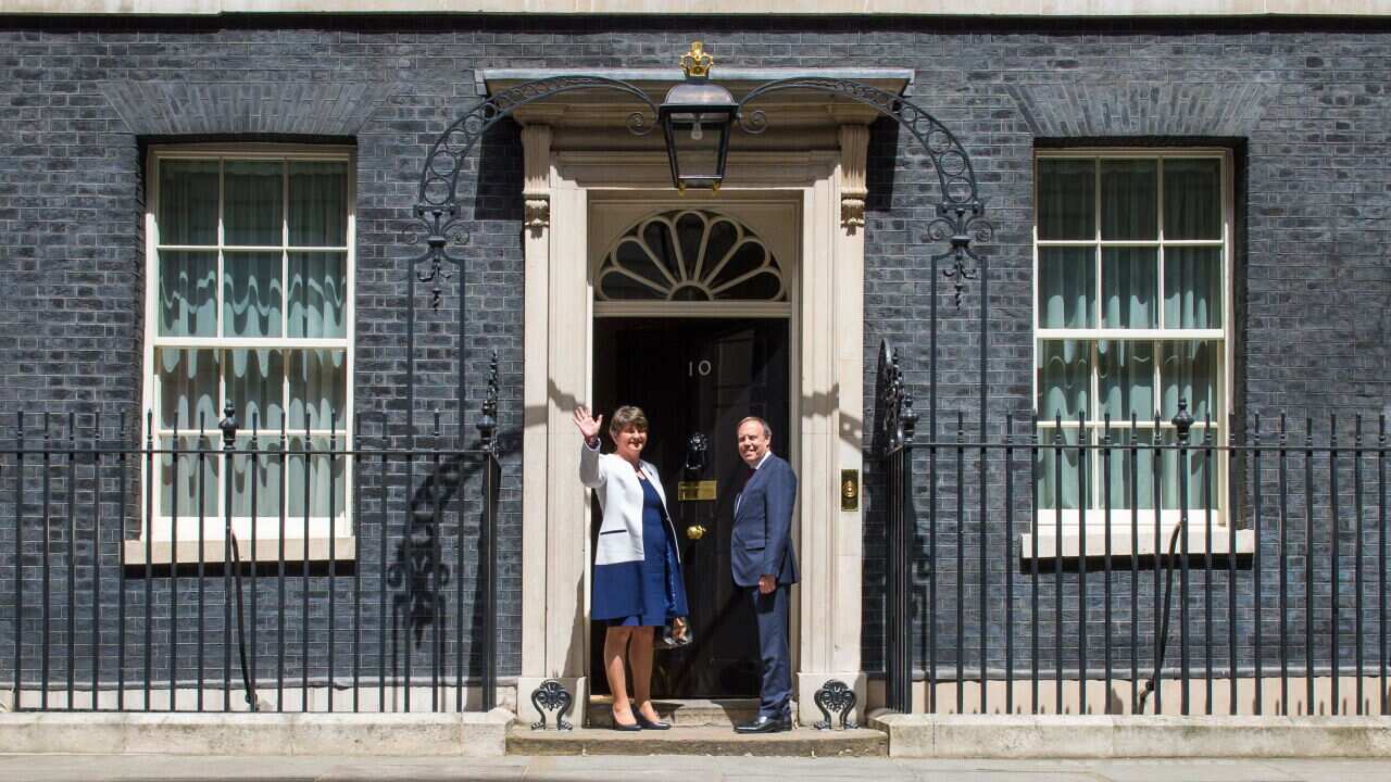 DUP leader Arlene Foster and DUP deputy leader Nigel Dodds arriving at 10 Downing Street in London for talks on a deal to prop up a Tory minority administration