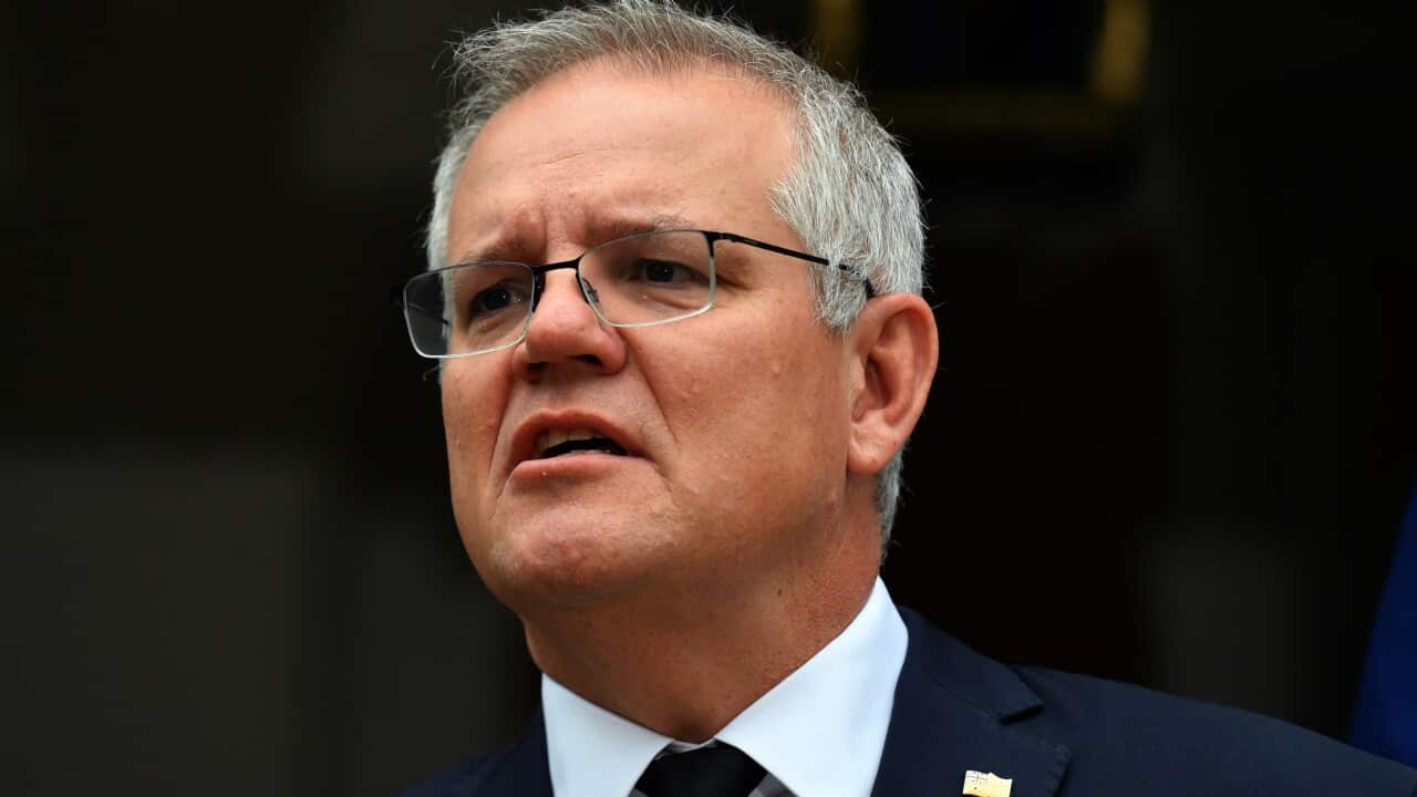 The federal government says every coronavirus vaccine approved for use in Australia will be continuously reviewed after the death of a NSW woman.