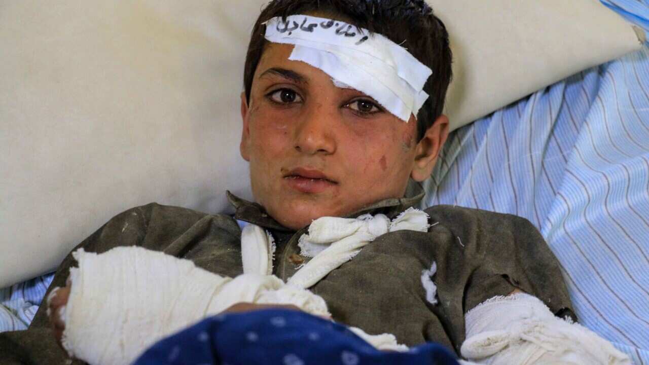 An injured victim of the earthquake receives treatment at a hospital in Paktia,