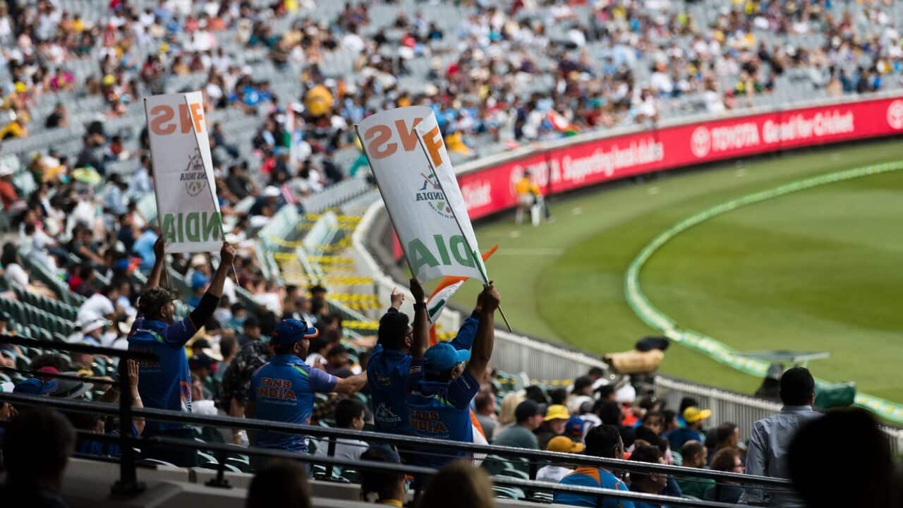 Fans flying flags and cheering during day two of the Test cricket match between Australia and India at the Melbourne Cricket Ground, 27 December, 2020