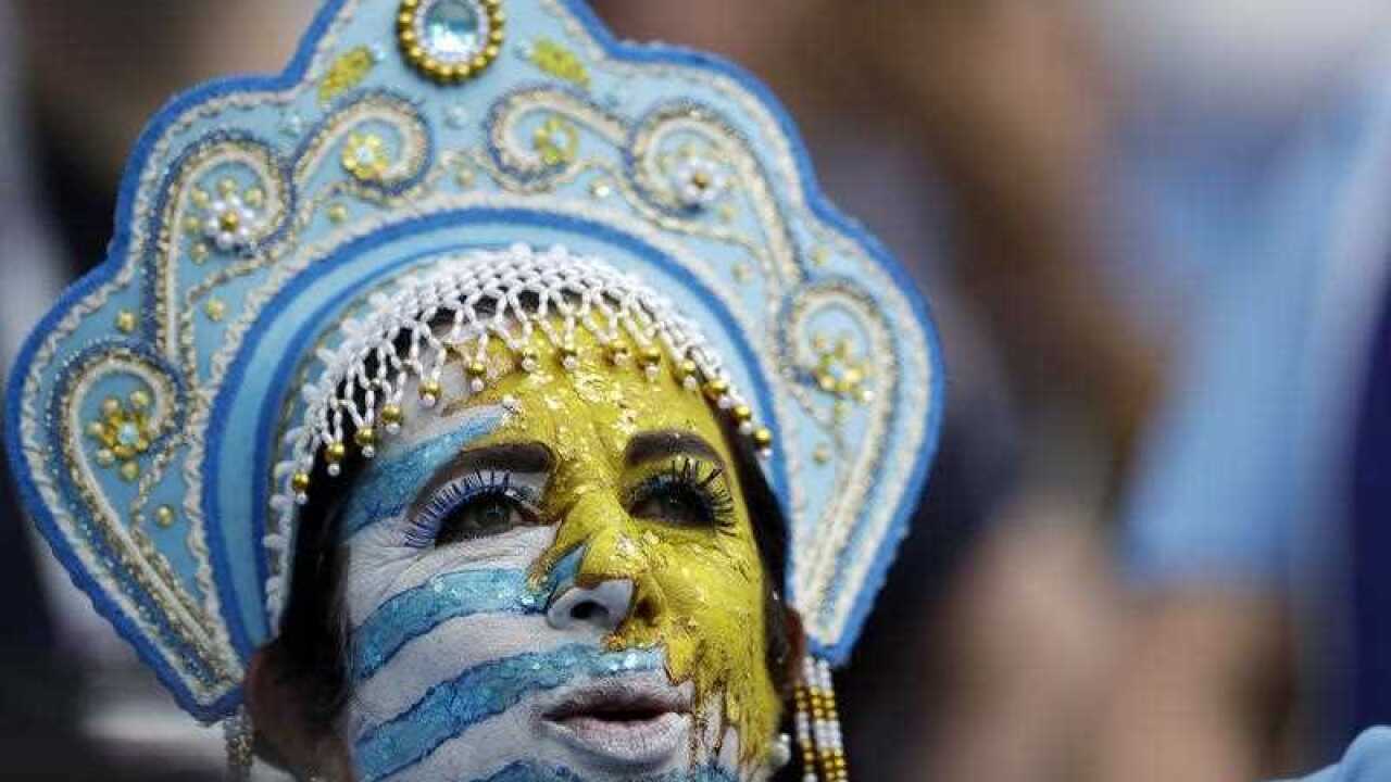 Uruguay's supporter, wearing a Russian women traditional headdress named Kokoshnik.
