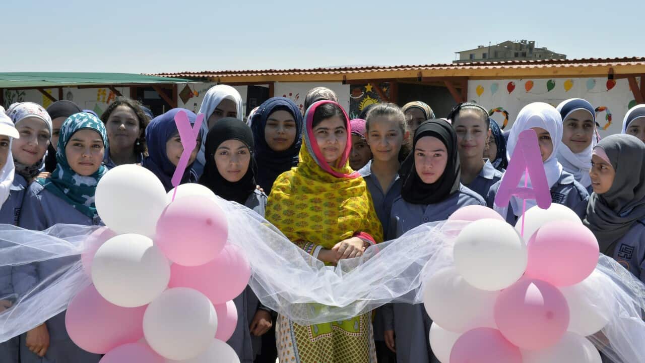 Pakistani Nobel Peace Prize laureate, Malala Yousafzai with Syrian refugees during the opening of the Malala Yousafzai All-Girls School