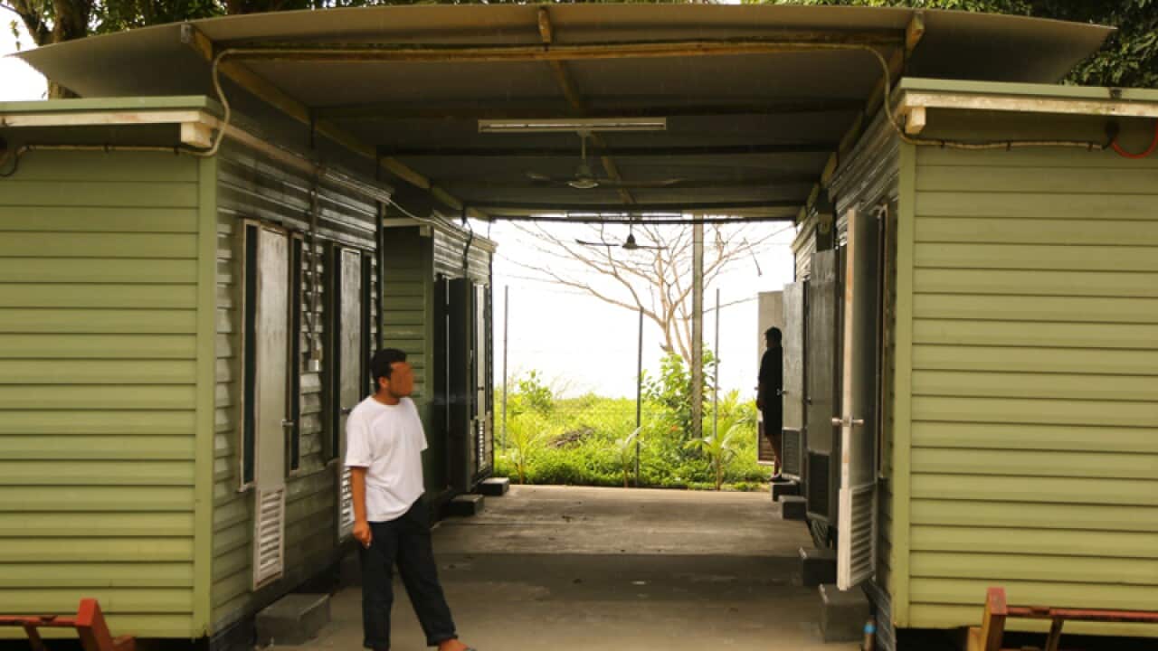 An asylum seeker arriving on Manus Island