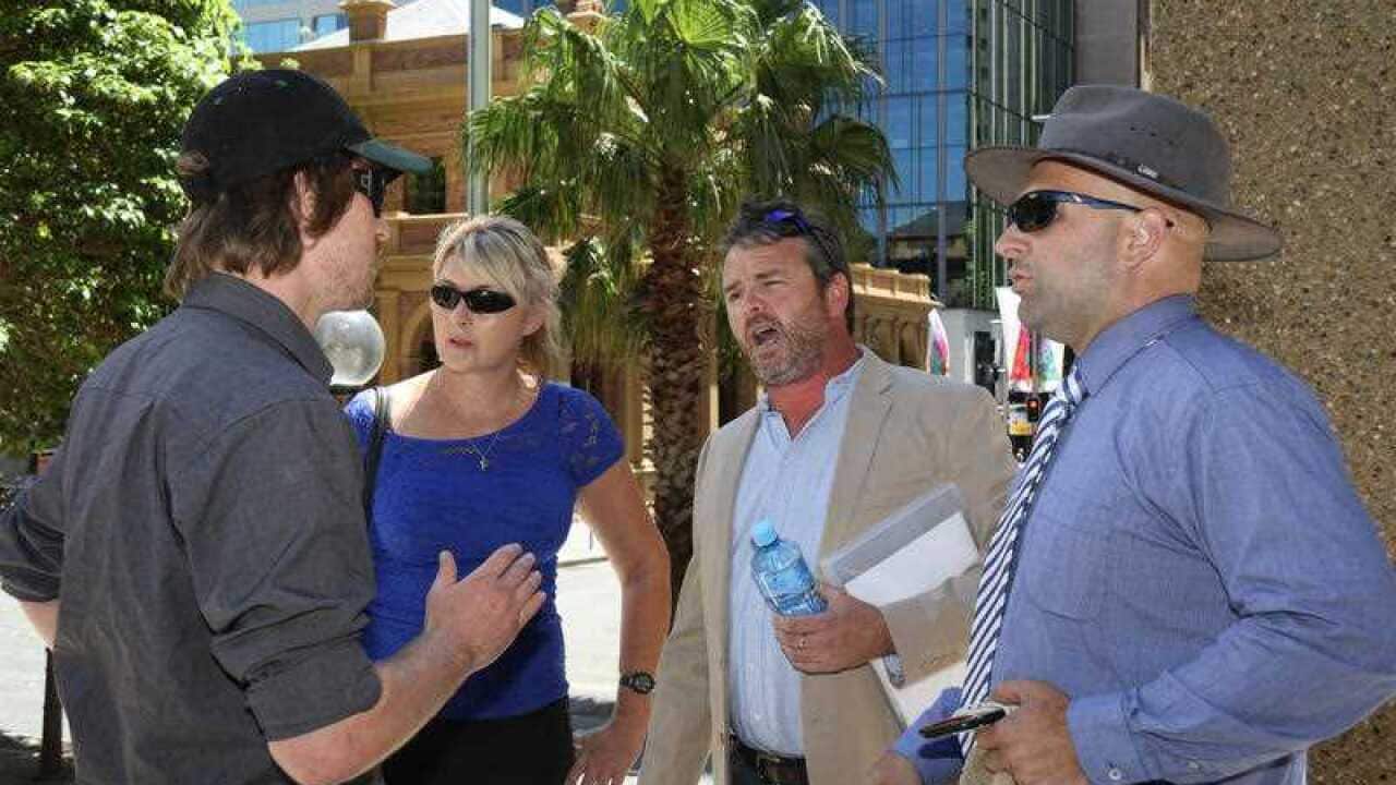 Party for Freedom chairman Nick Folkes arrived at Sydney's Supreme Court on December 4, 2015 and was confronted by Shayne Hunter, believed to be from an anti-fascist group.