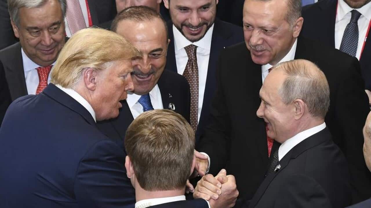 US President Donald Trump with Russian President Vladimir Putin