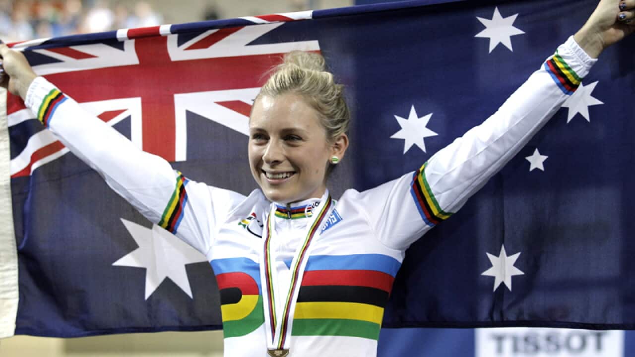 Annette Edmondson of Australia celebrates in Paris