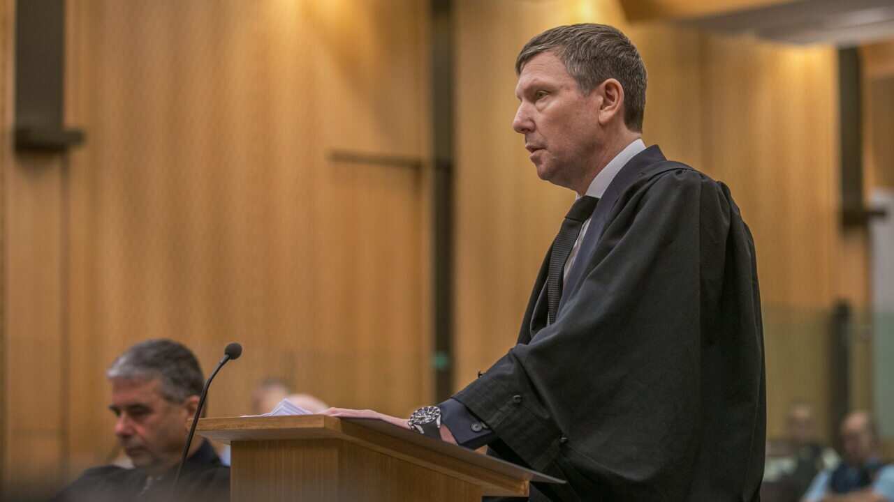 Crown counsel, Barnaby Hawes, reads the summary of facts during the sentencing of an Australian gunman at the High Court in Christchurch, New Zealand.