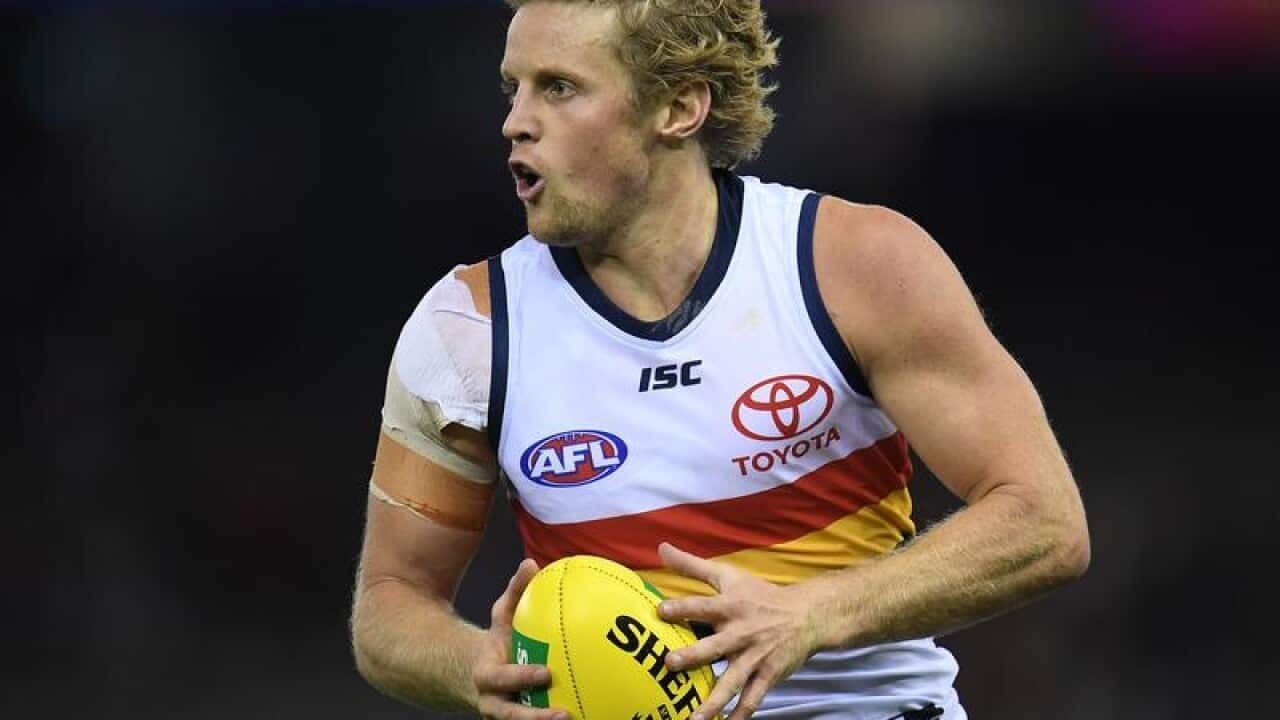 Rory Sloane of the Crows is seen in action