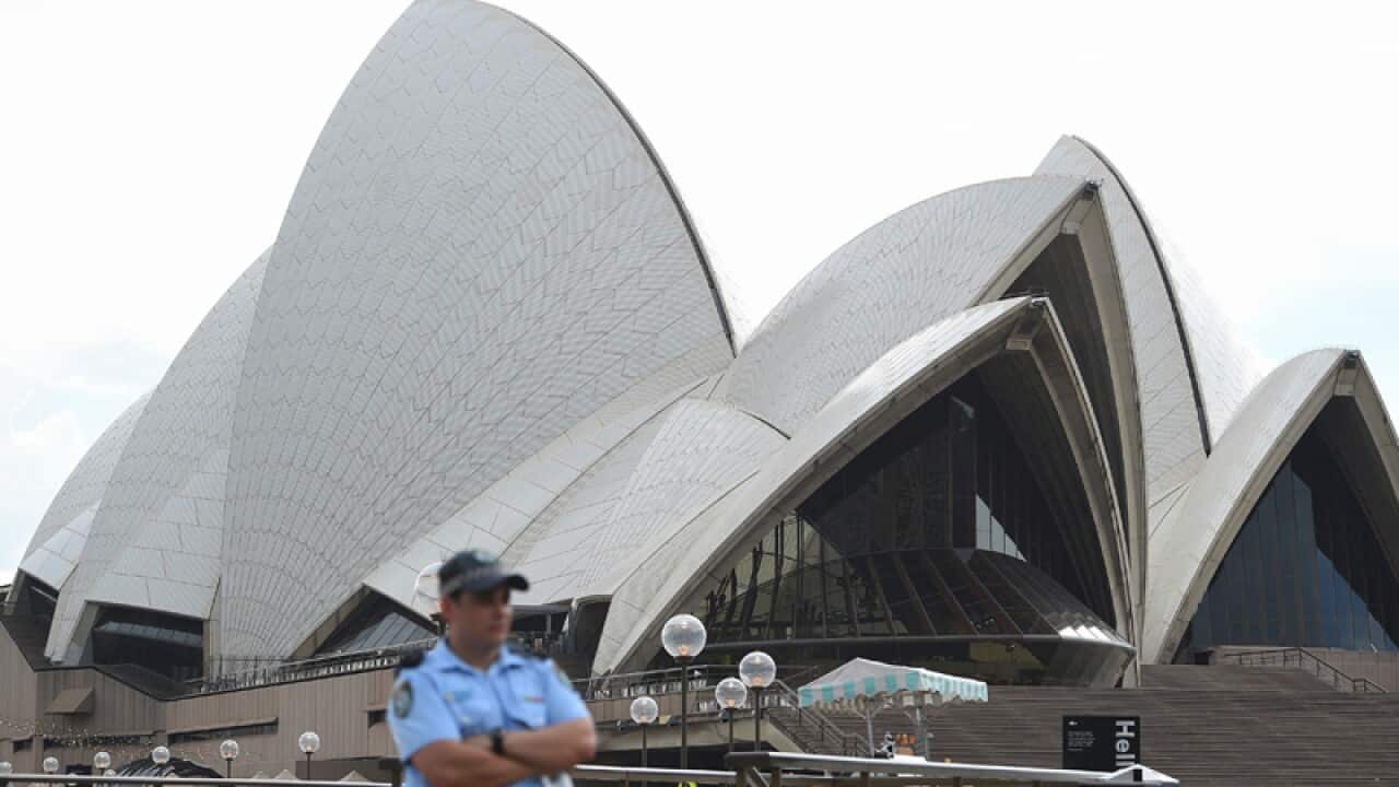 The Sydney Opera House is evacuated during a police operation