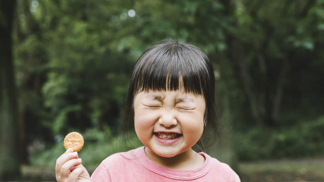 Asian girl playing in the park