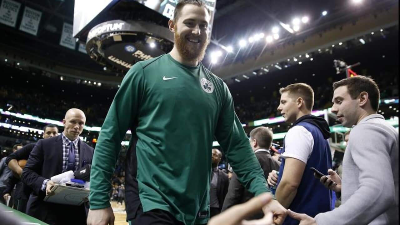 Boston Celtics' Aron Baynes leaves the court.