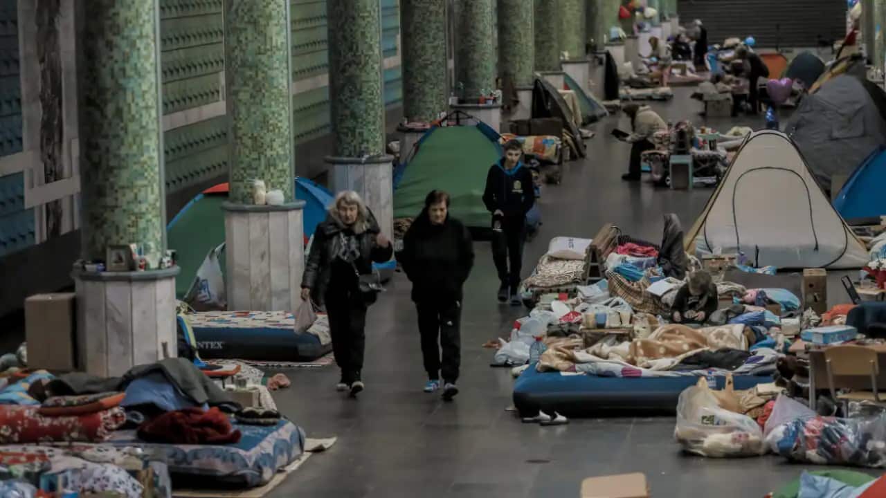 Ukrainians are seen at a metro station after fleeing Russia's invasion of Ukraine on 11 May, 2022.