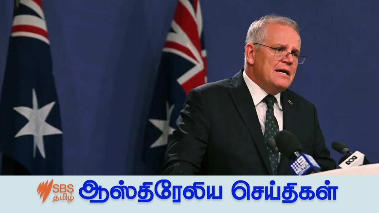Australia's Prime Minister Scott Morrison speaks to the media to announce sanctions on top Russian officials