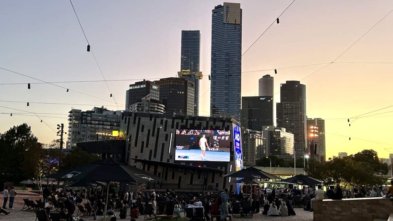 Spectators watching an Australian Open match in Federation Square, Melbourne.