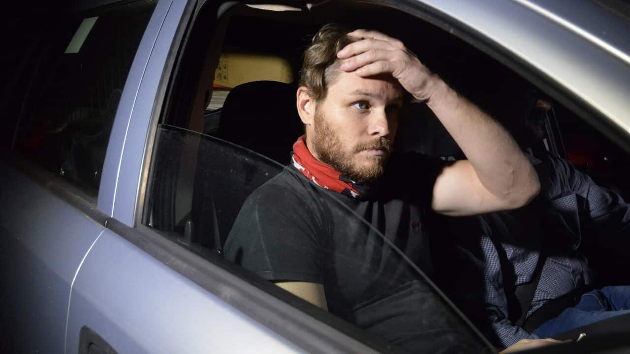 Jock Palfreeman reacts as he leaves migrants' detention centre in Busmantsi, Bulgaria, Tuesday, Oct. 15, 2019.