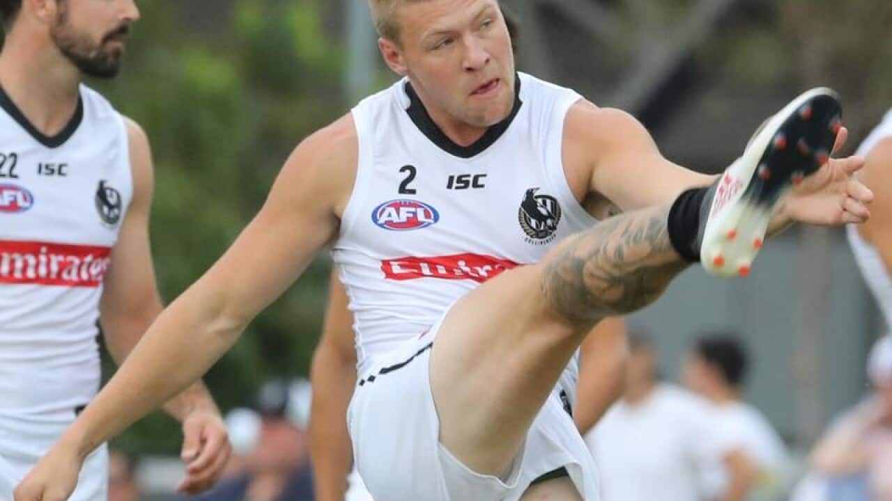 A file image of AFL player Jordan De Goey warming up.