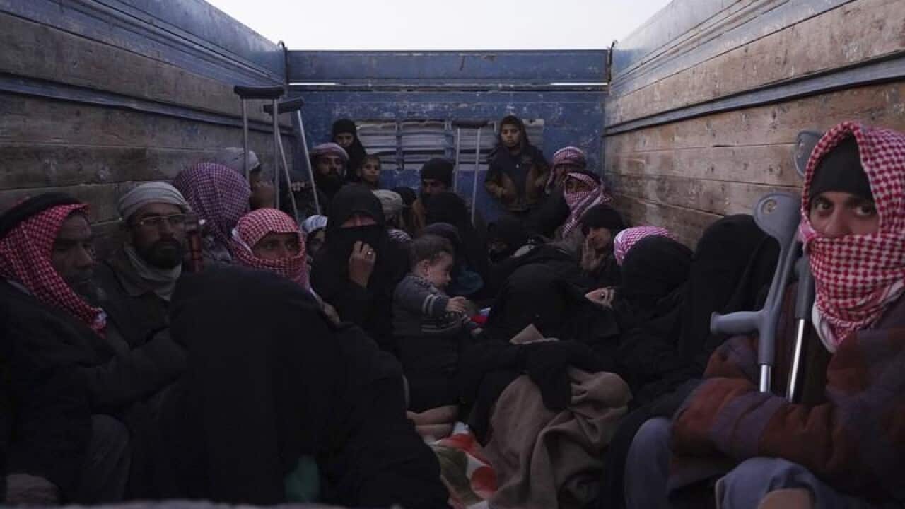 People being evacuated from territory held by Islamic State militants