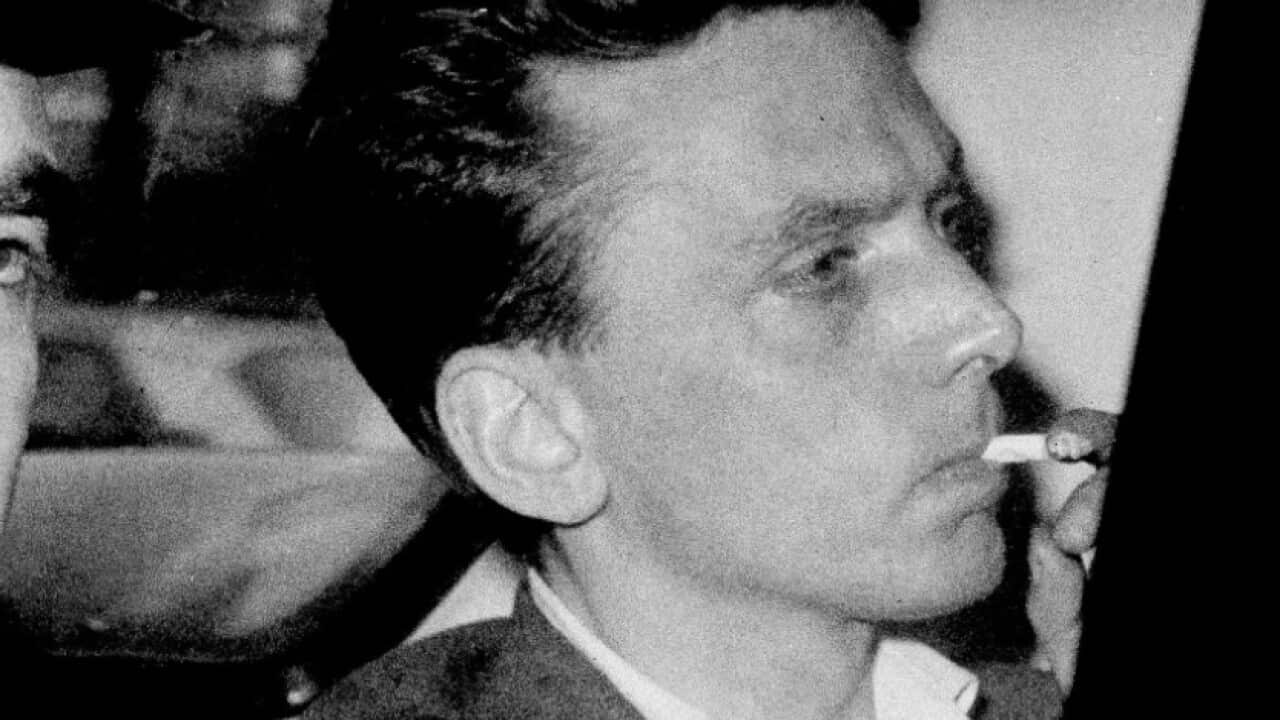 In this file photo dated Oct. 1965, Ian Brady is escorted as he arrives at the courthouse in Hyde, Cheshire, England