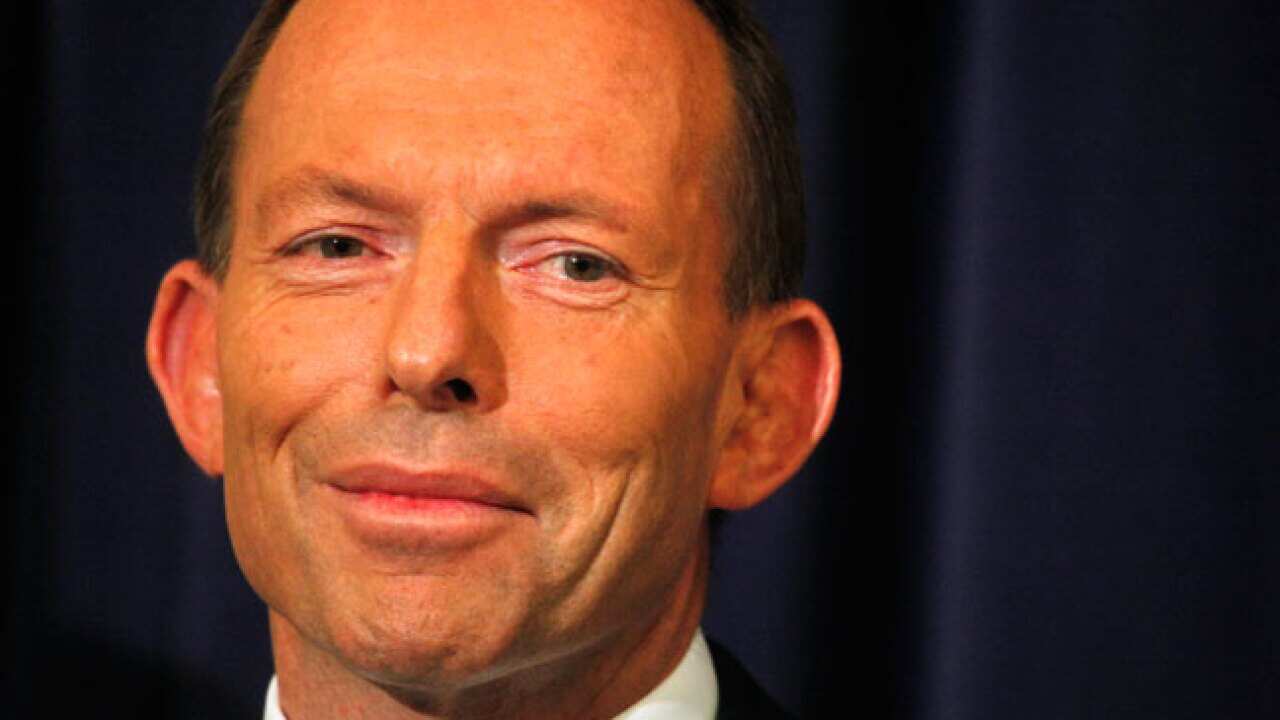 Tony_abbott_smirk_b_110923_aap_1328272766
