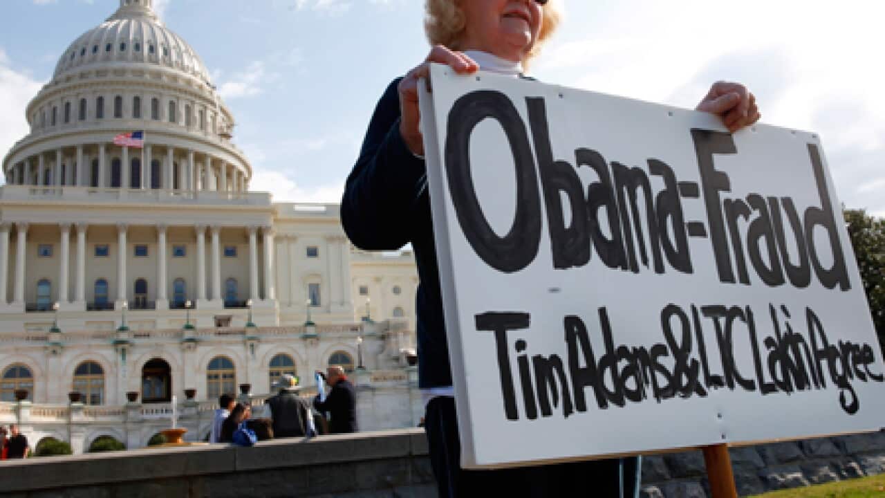 obama_sign_whitehouse_101029_B_ap_767676165