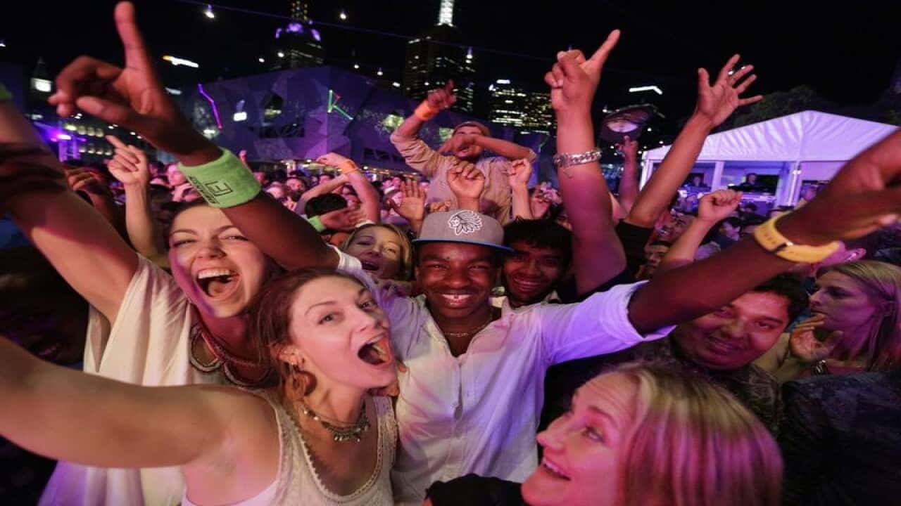 People celebrating New Year's Eve at Federation Square