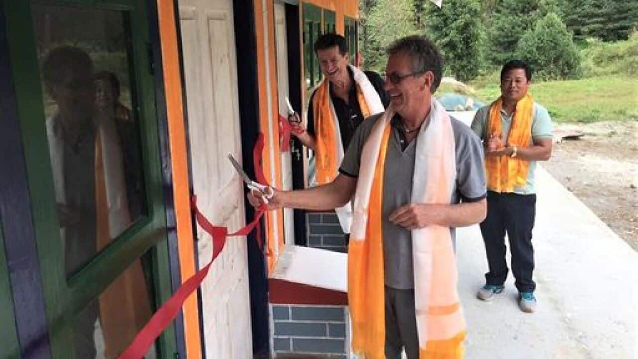 sb and neil at Garma (the day my back broke).jpeg