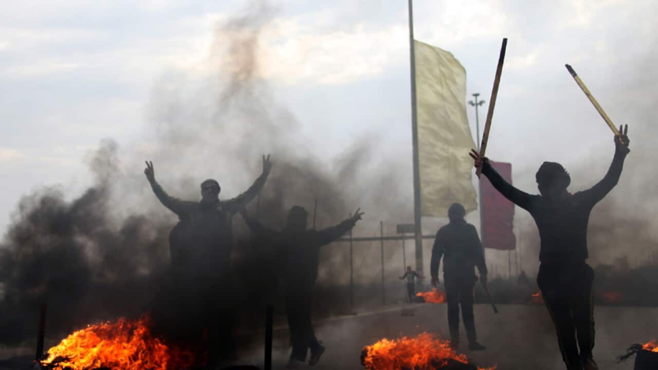 Iraqi Sunni protesters outside Fallujah