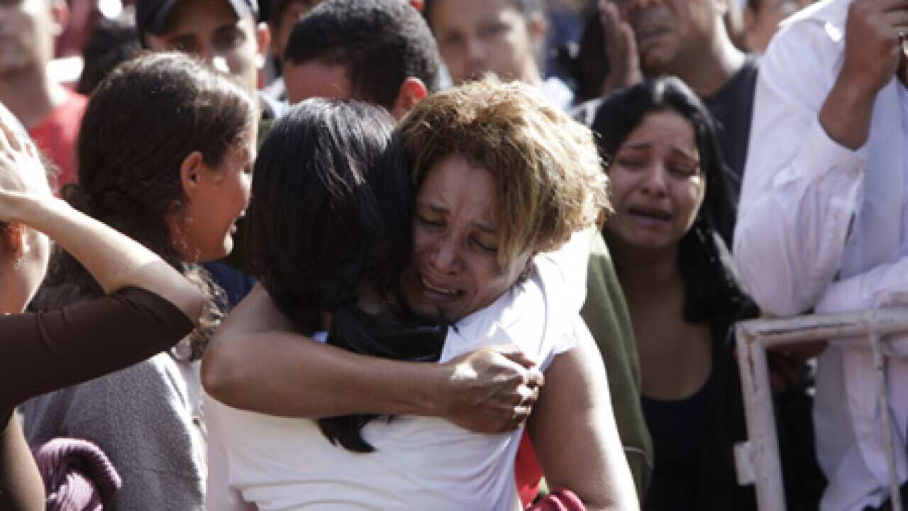 brazil_floods_mourning_100409_L_aap_1195735328