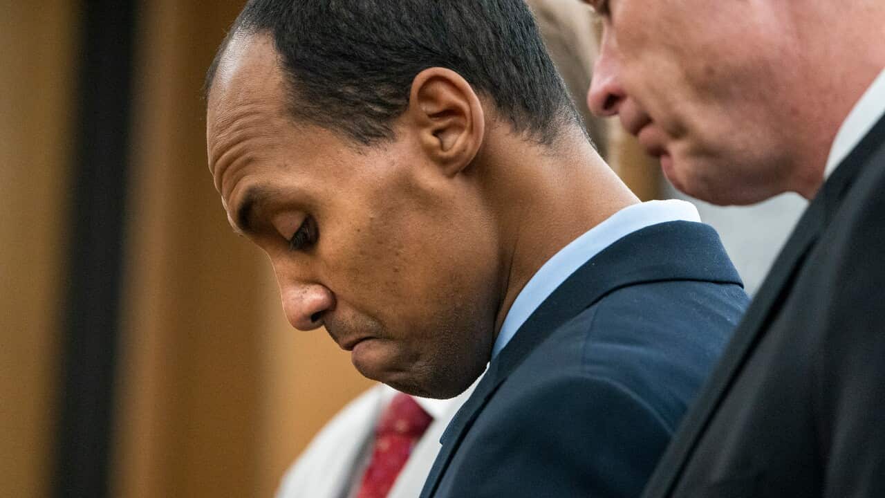 Former Minneapolis police officer Mohamed Noor reads a statement before being sentenced by Judge Kathryn Quaintance.