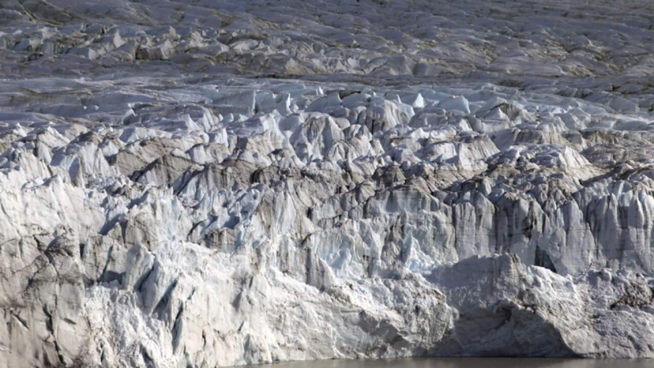 The melting front of a glacier at the edge of the Greenland ice sheet