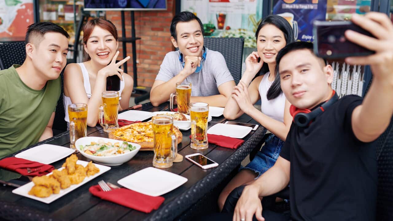Selfie portrait of friends in cafe