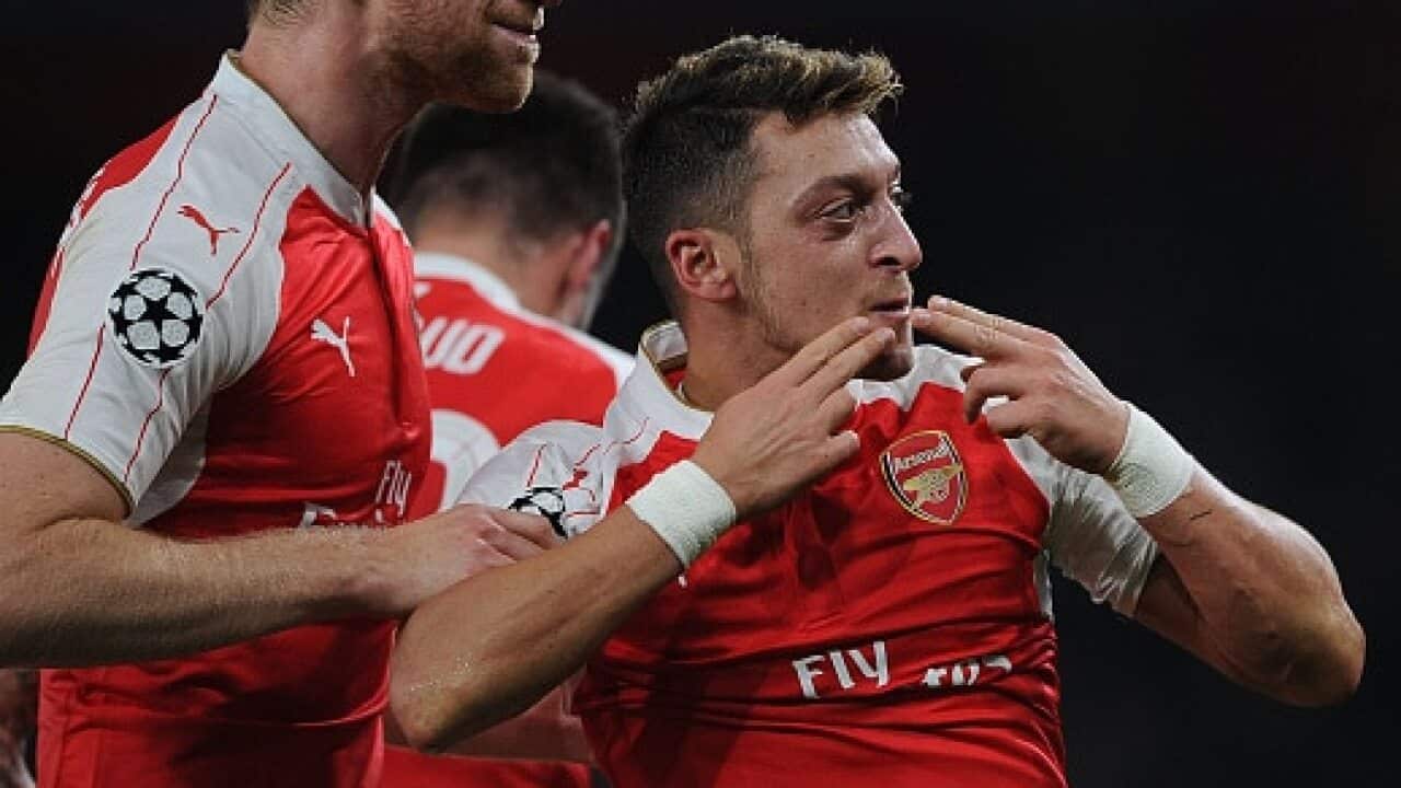 Mertesacker and Ozil