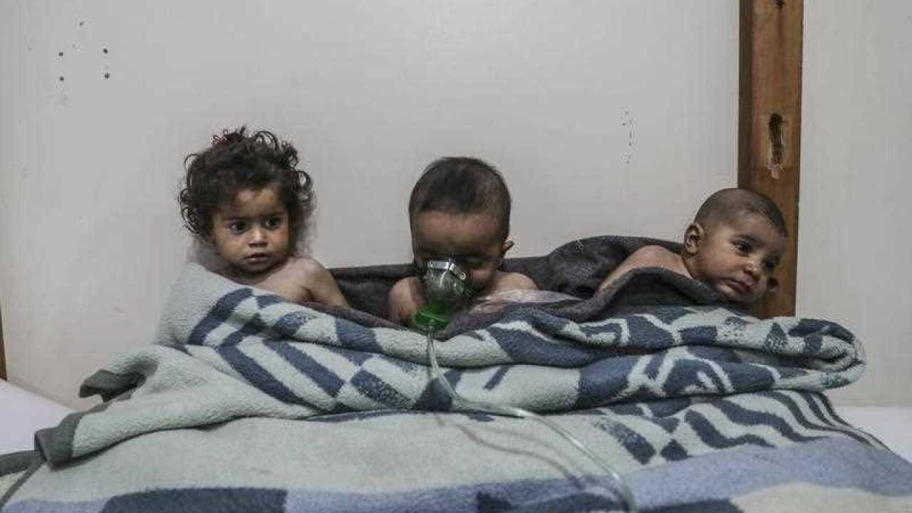 Affected children receive treatment after a gas attack on al-Shifunieh village, in Eastern Ghouta, Syria, 25 February 2018