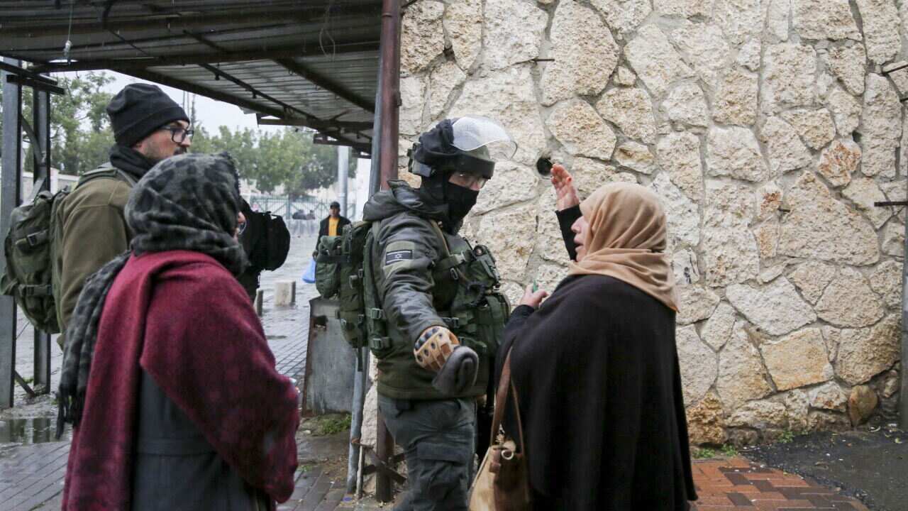 Muslims cross Israeli checkpoint for first Friday of Ramadan - Bethlehem