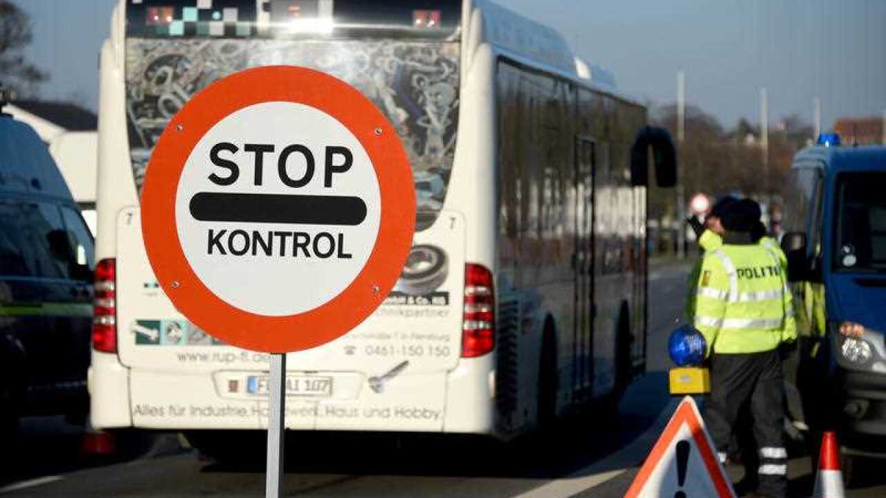 Members of the Danish police have set up a border checkpoint at Krusa border crossing near Flensburg, Germany, Tuesday Jan. 5, 2016. (Carsten Rehder/dpa via AP)