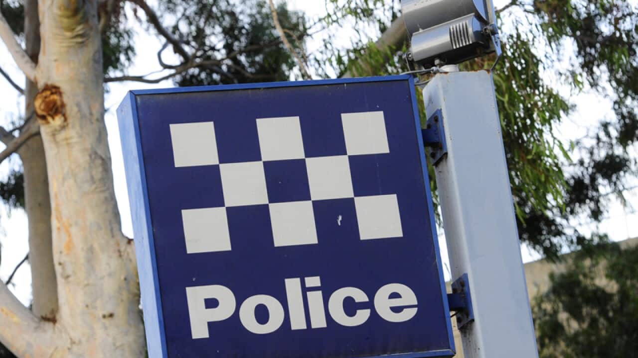 A police station sign