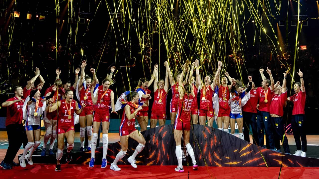 The volleyball women's team of Serbia celebrates winning the final match at the 2022 World Championship against Brazil in Apeldoorn