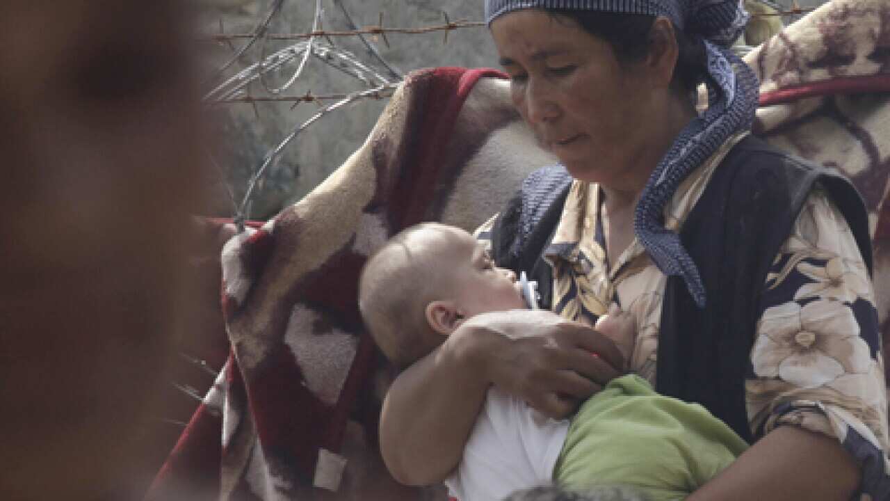 uzbek_woman_b_100618_afp_1424677696