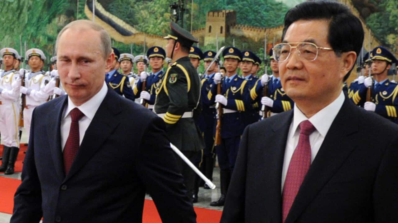 putin_china_L)120605_ap_1358874570