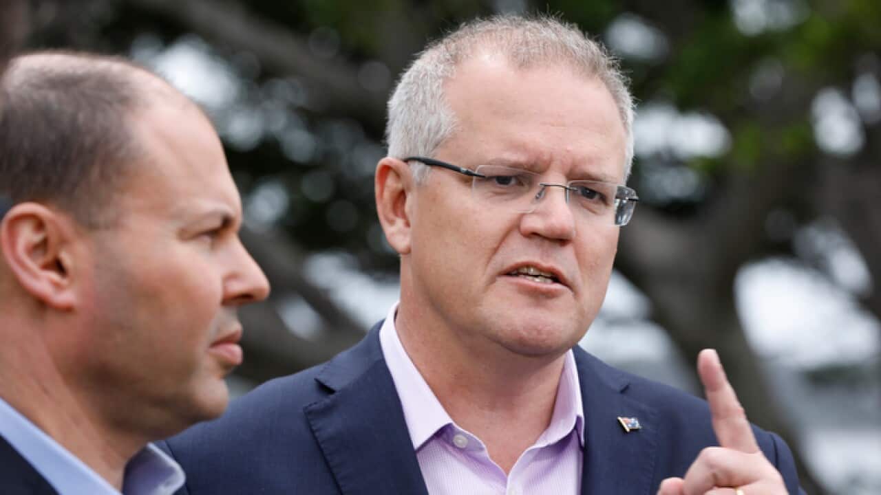 اسکات موریسون نخست وزیر استرالیا در سمت راست و جاش فرایدنبرگ خزانه دار استرالیا