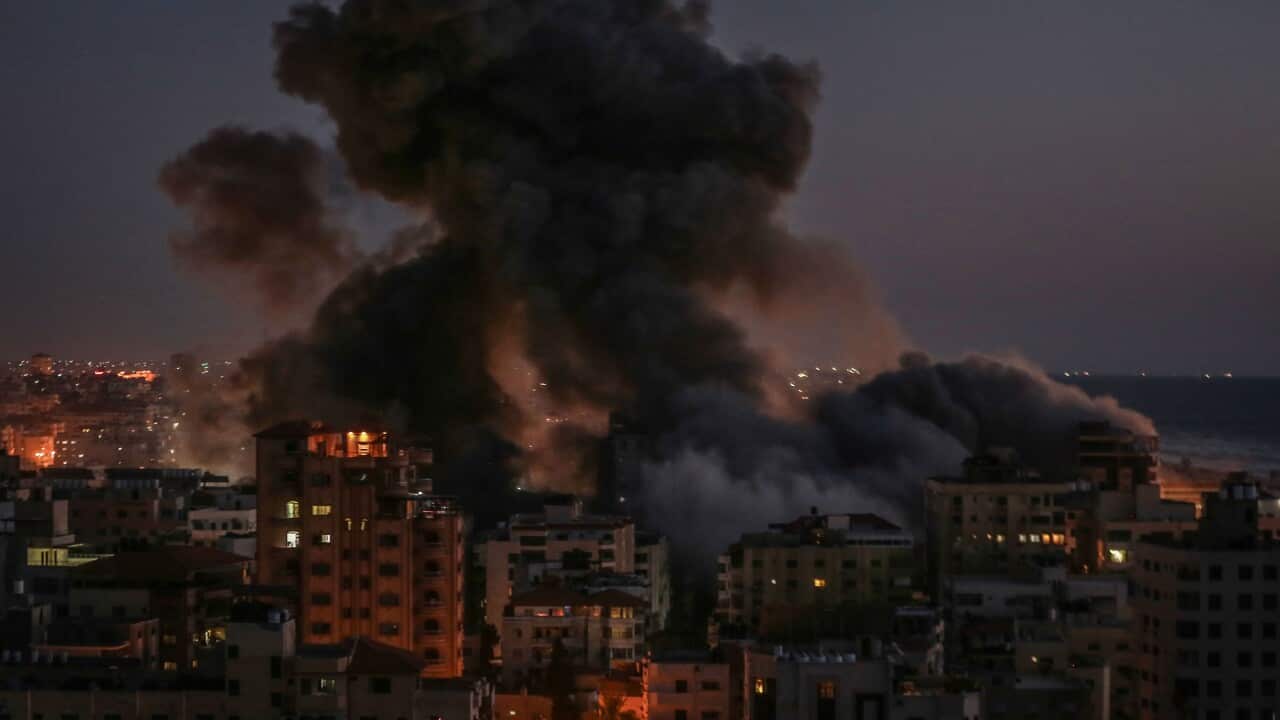 Smoke billows from the Hanadi residential tower in Gaza after it was hit by an Israeli airstrike amid the escalating flare-up of Israeli-Palestinian violence.