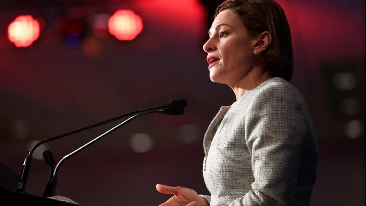 Queensland Treasurer Jackie Trad at a lectern